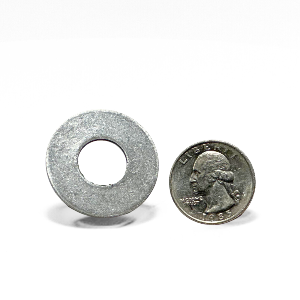 Close-up of American Rod Company’s 304 Stainless Steel Flat Washer next to a quarter, highlighting the precise dimensions for secure fittings in compliance with NFPA 780 and UL 96A standards.