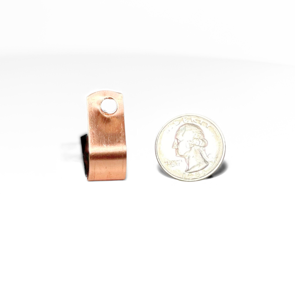 Copper loop type cable fastener next to a quarter, demonstrating size; essential for electrical grounding, aligns with LPI 175 specifications by American Rod Company.