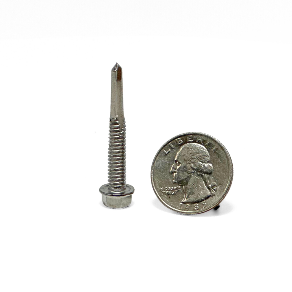 This view focuses on the Tek 5 self-drilling point alongside a quarter to highlight the screw’s capability for quick and efficient penetration into steel structures. It emphasizes the screw’s role in lightning protection systems, where adherence to LPI 175 and UL 96A standards is critical for ensuring system integrity and safety.