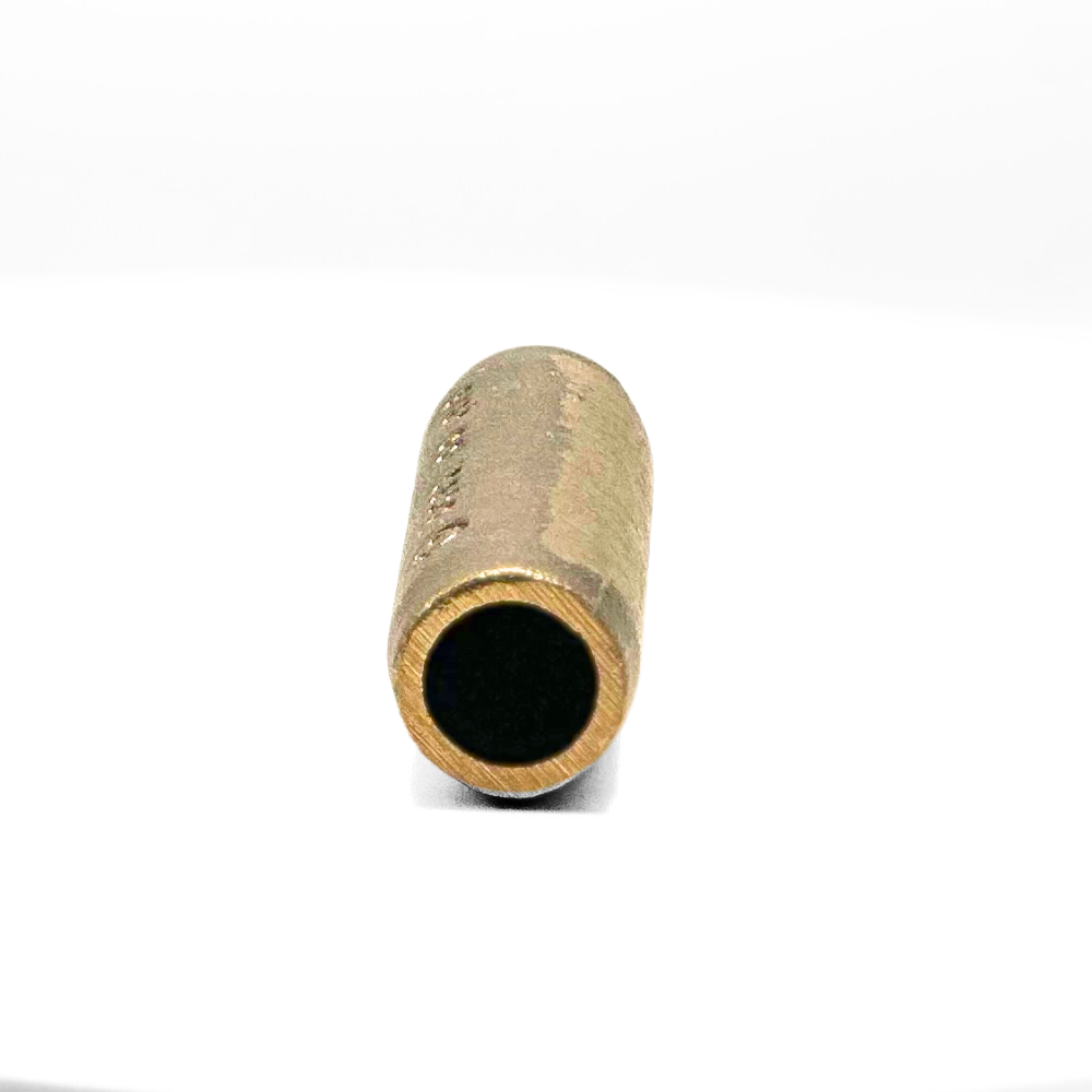 An angled view of the 5/8” Bronze Threadless Ground Rod Coupler, illustrating its precise construction and suitability for connecting ground rods. This coupler enhances the reliability of grounding and lightning protection systems provided by American Rod Company, in compliance with NFPA 780, UL 96A, and LPI 175 standards.