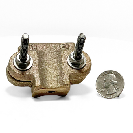 In this photo, American Rod Company’s Copper Pipe Bonding Clamp is shown next to a quarter for size reference. This cast copper pipe bonding clamp is designed for securing main-sized cables to pipes in lightning protection systems. It features dual stainless steel U-style bolts for easy tension adjustment, ensuring a strong connection. UL Listed and NFPA 780 compliant.