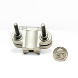 In this photo, American Rod Company’s Cast Aluminum Pipe Bonding Clamp is shown next to a quarter for size reference. This cast aluminum pipe bonding clamp is designed for securing main-sized cables to pipes in lightning protection systems. It features dual stainless steel U-style bolts for easy tension adjustment, ensuring a strong connection. UL Listed and NFPA 780 compliant.