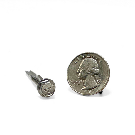 Displaying the hex washer head of the screw, this image includes a quarter for scale to demonstrate the robust size and engineering precision. American Rod Company’s screws are crafted to adhere to NFPA 780 and UL 96A standards, making them ideal for securing components in lightning protection systems where durability and reliability are paramount.