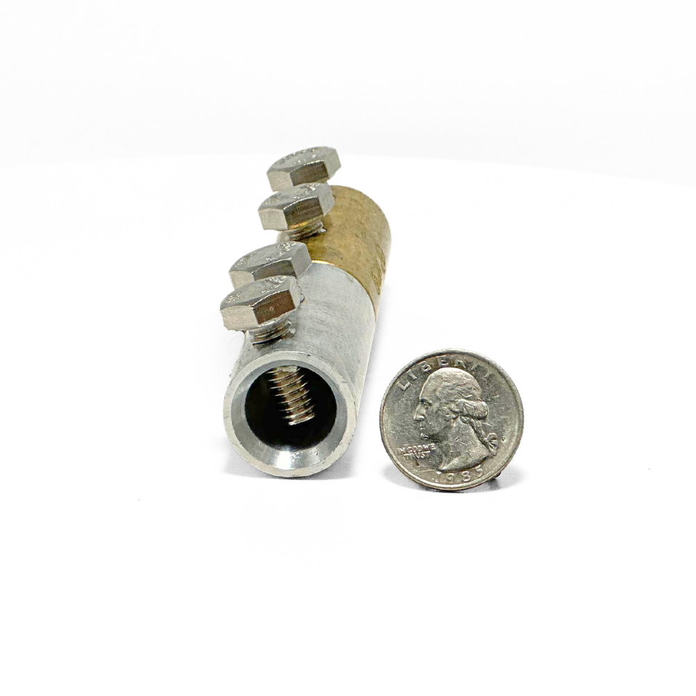 This angled photo with a quarter shows the aluminum cable opening is 50% as large. American Rod Company’s In-Line Bi-Metallic Cable Connector. Expertly designed to facilitate connections between copper and aluminum cables, this connector features a 1” diameter and a two-bolt tension grip system for secure connections. Constructed from aluminum, brass, and stainless steel 304 for durability. UL 96A and LPI 175 certified.